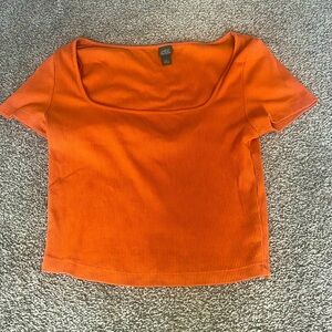 Orange cropped shirt